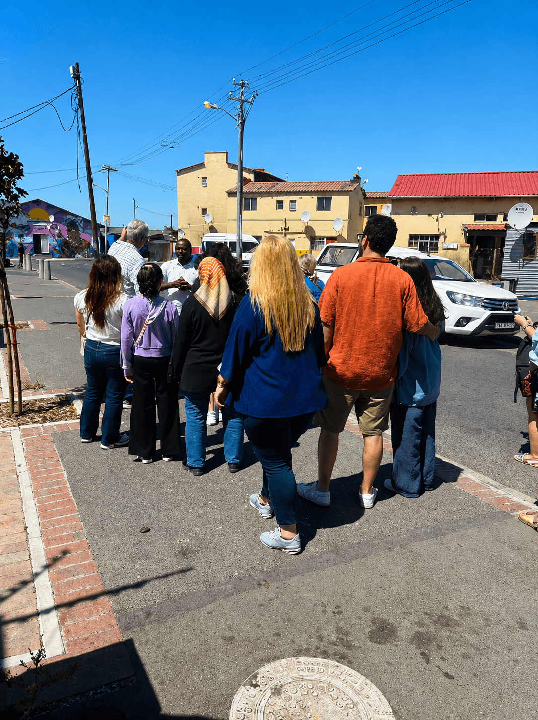 Township tour group with a local guide in Langa
